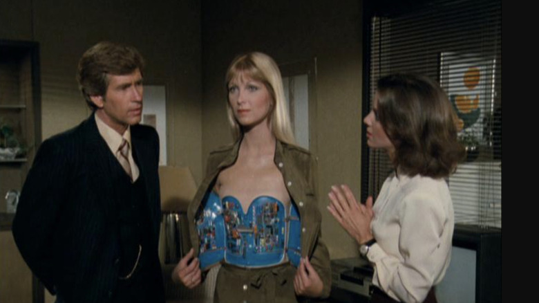 John Moore and Pamela Williams strip down a Delos robot in Beyond Westworld