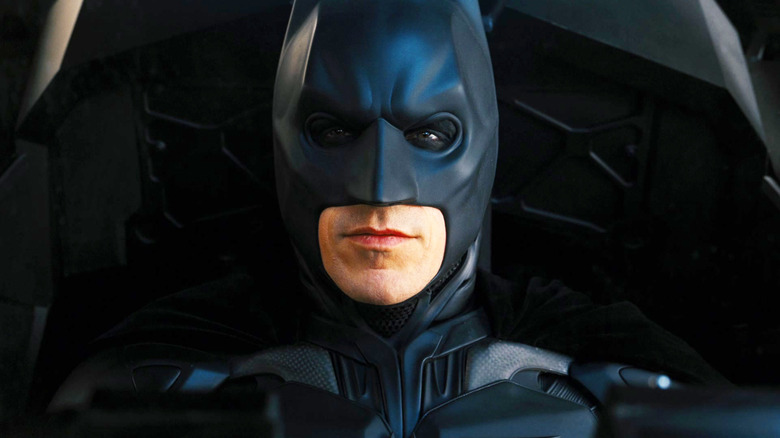 Christian Bale as Bruce Wayne wearing his bat mask in The Dark Knight Rises