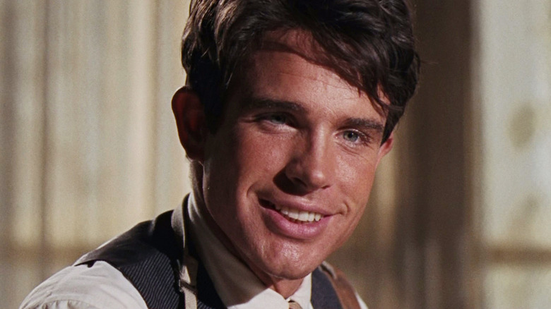 Warren Beatty flashes a killer grin as Clyde Barrow in Bonnie and Clyde