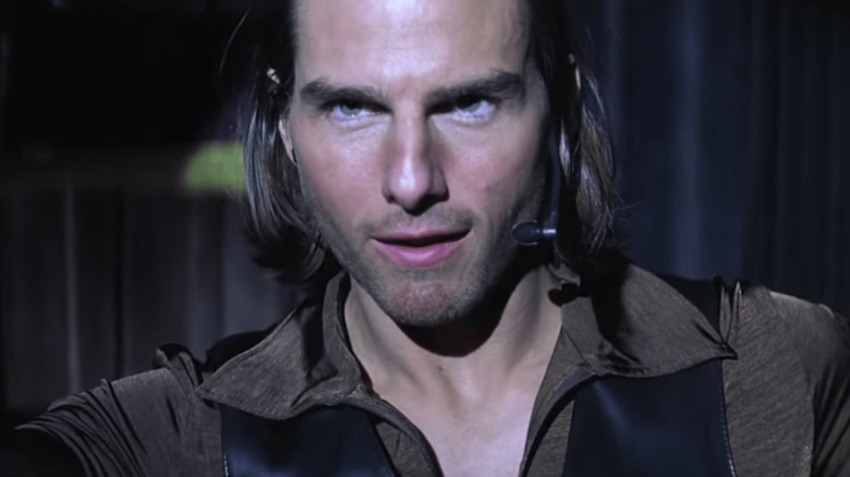 Frank Mackey (Tom Cruise) smirks on stage in Magnolia