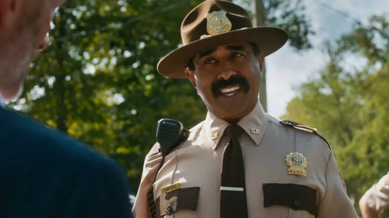 Jay Chandrasekhar as Thorny talking with someone off screen in Super Troopers 3