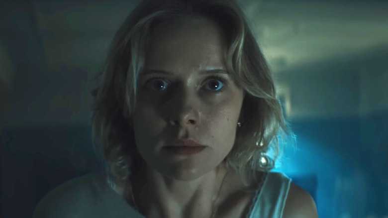 Amelia Eve as Gemma with a look of fear on her face in Insidious: Out of the Further