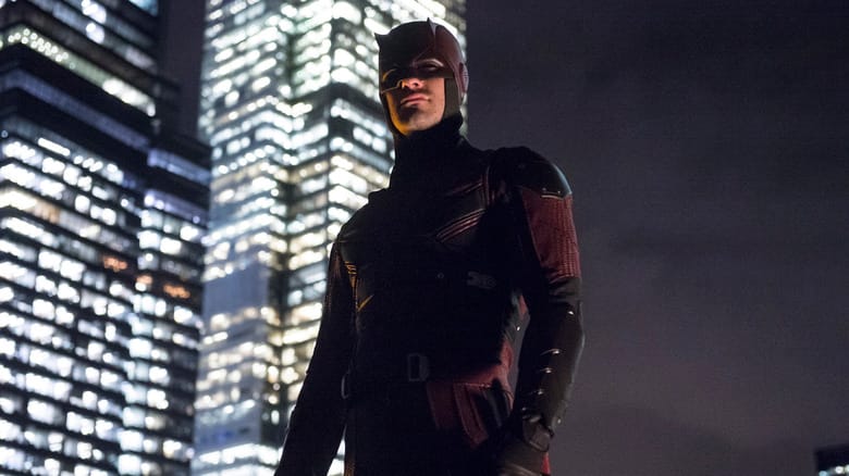Charlie Cox as a Daredevil standing on a rooftop in Daredevil
