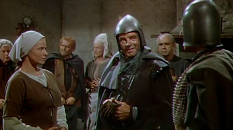 Ingrid Bergman's Joan of Arc is seen standing alongside Leif Erickson's Jean de Dunois in Joan of Arc
