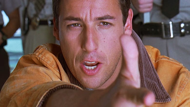Adam Sandler's Archie Moses makes a finger gun in Bulletproof