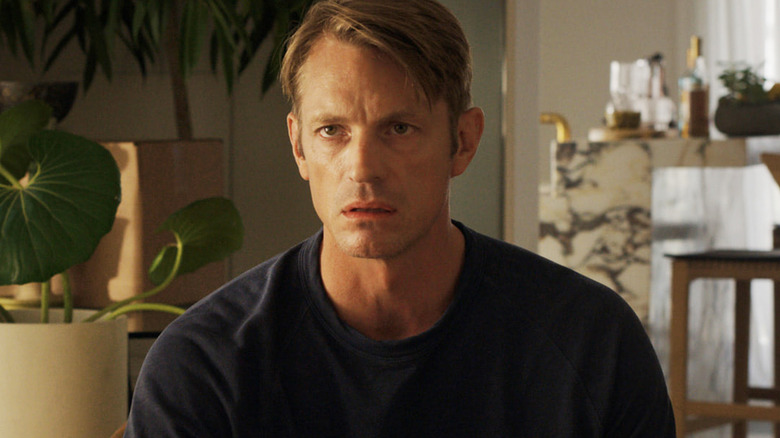 Joel Kinnaman's Robert sits looking gormless in Imperfect Women