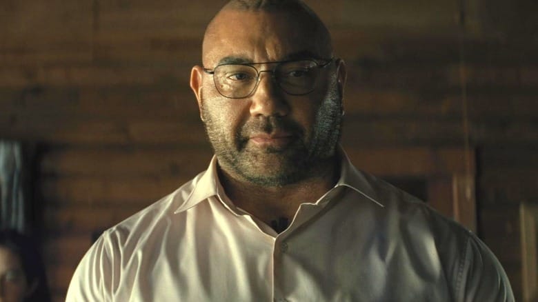 Dave Bautista as Leonard confronting Eric, Andrew, and Wen in Knock at the Cabin