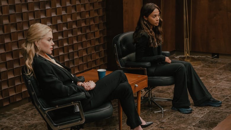 Nicole Kidman's Kaitlyn Meade sits alongside Zoe Saldaña's Joe McNamara in a CIA office in Lioness