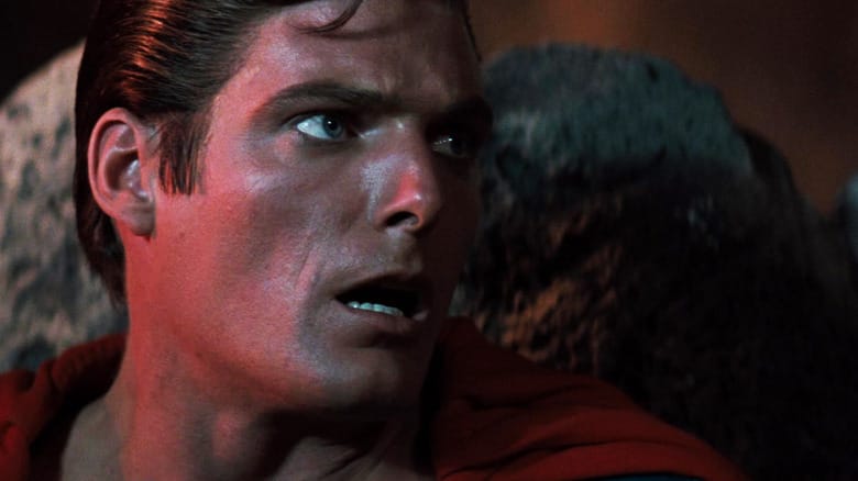 Christopher Reeve's Superman looks off to his left in closeup in Superman III