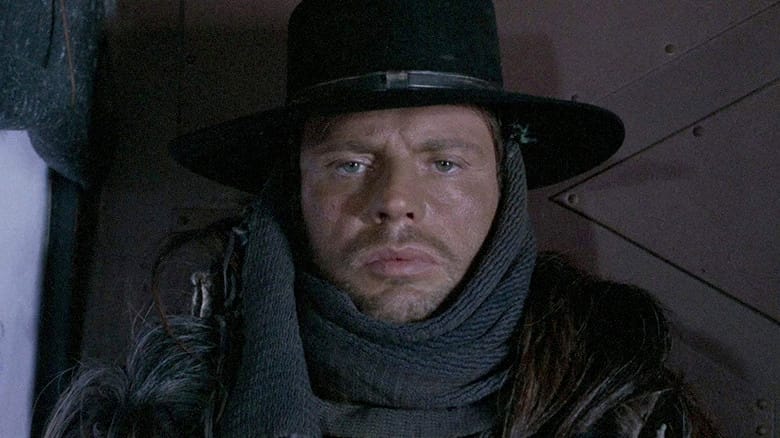 Loco (Klaus Kinski) stares intently in The Great Silence
