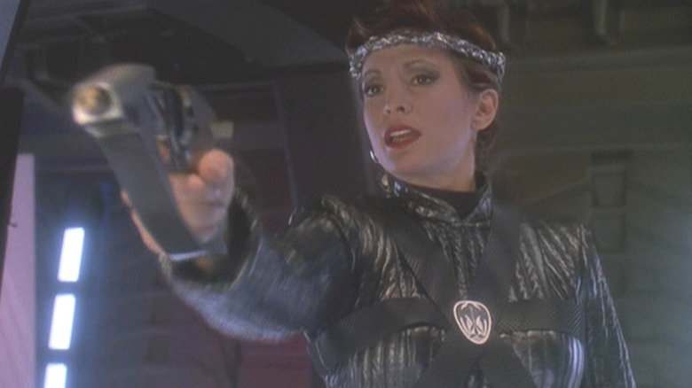 Indendent Kira with a phaser on Star Trek: Deep Space Nine
