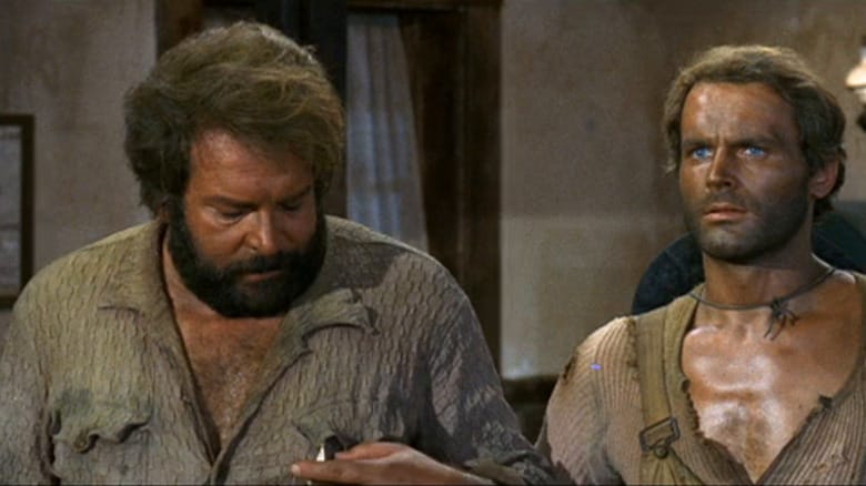 Bambino (Bud Spencer) and Trinity (Terence Hill) stand together in They Call Me Trinity