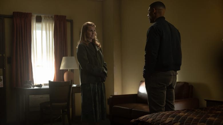 Laura Linney's Lianna stands in a motel room opposite Aaron Pierre's John Stewart in Lanterns