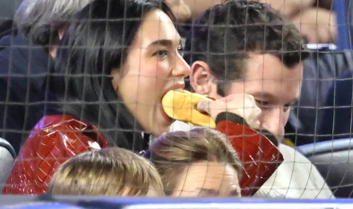 Dua Lipa chows down on a hot dog and more star snaps