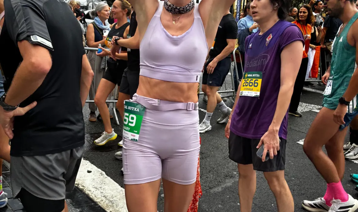 Amber Heard laughing and celebrating after completing her first half marathon in Donostia.