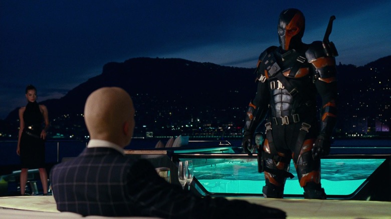 Joe Manganiello's Slade Wilson/Deathstroke stands in front of Jesse Eisenberg's Lex Luthor in Justice League