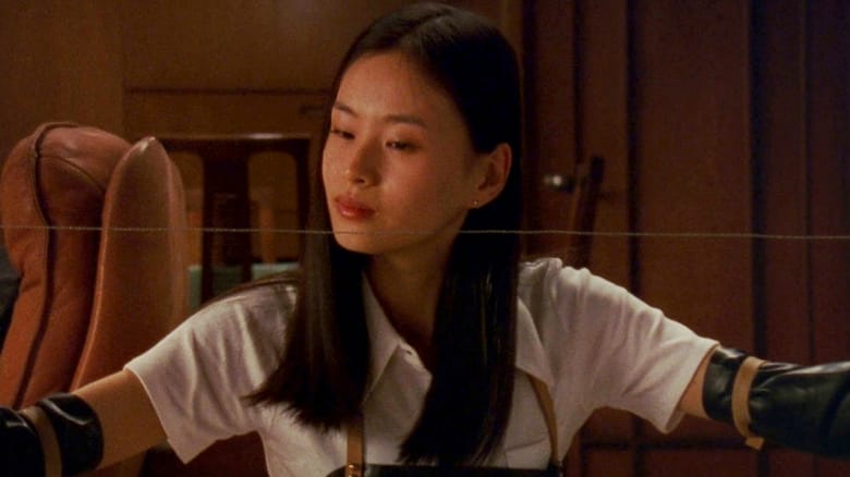 Asami Yamazaki (Eihi Shiina) draws out a piano wire in Audition (1999)