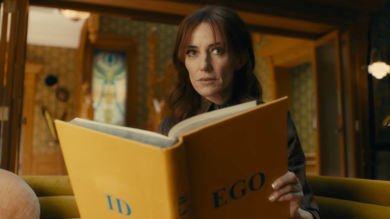 VisionQuest - FRIDAY reading big book titled "ID EGO"