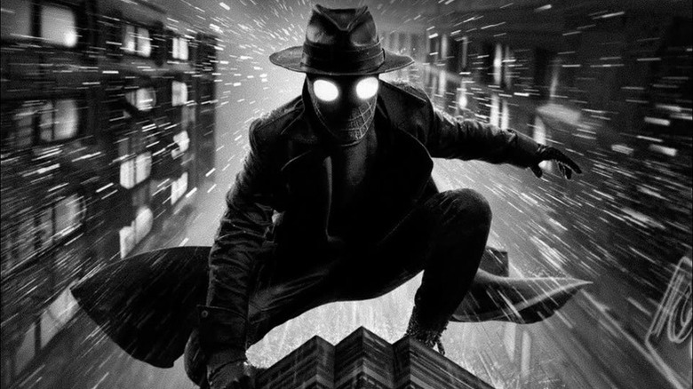 The Spider, in black and white, posed on rooftop in Spider-Noir