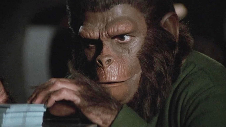 Caesar wearing a green shirt in Conquest of the Planet of the Apes