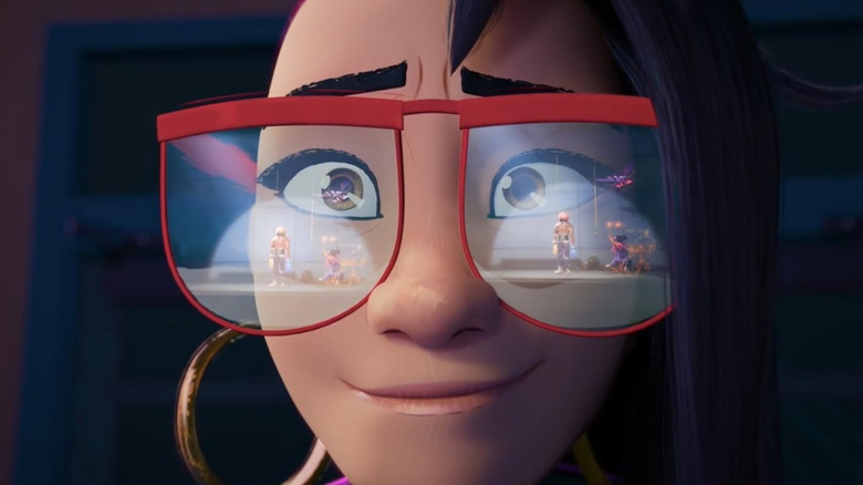 Liza Soberano as the voice of Raissa smiling wistfully with old footage reflecting in her glasses in Forgotten Island