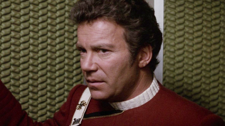 Admiral Kirk standing in a turbolift in Star Trek II: The Wrath of Khan