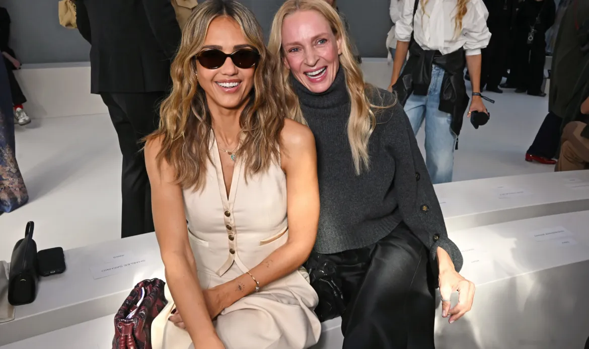 Jessica Alba and Uma Thurman sit in the front row of the Zimmermann show during Paris Fashion Week.