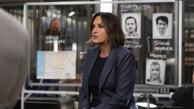 Benson in front of a board of suspects in Law & Order: Special Victims Unit