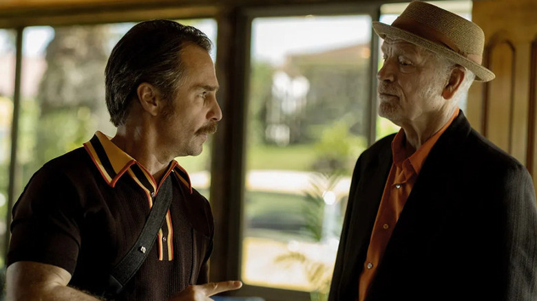 Sam Rockwell as Lee Chesterfield and John Malkovich as Chris Carlisle stare each other down in Wild Horse Nine