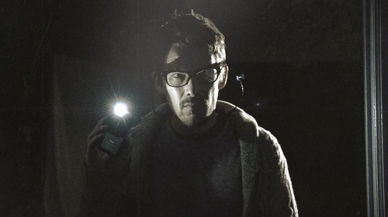 A distraught Ellison Oswalt (Ethan Hawke) stares emotionally ahead in Sinister