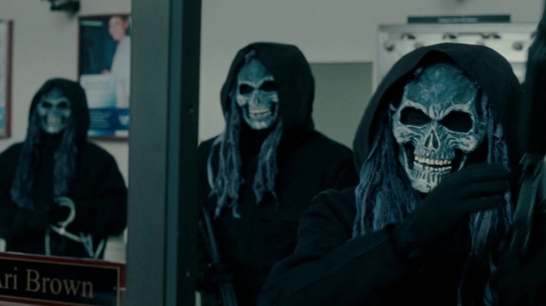 The Town - bank robbers in blue skull masks and black hoodies