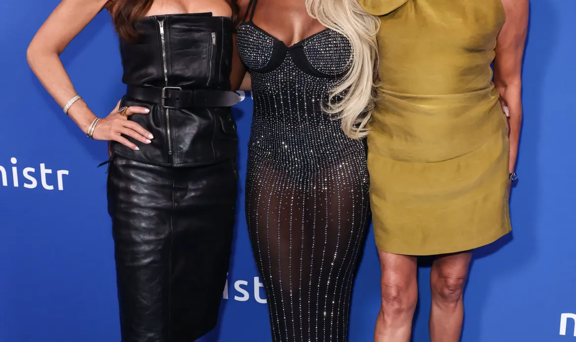 Meredith Marks, Phaedra Parks, and Sutton Stracke posing on a blue carpet at MISTR's 2nd Annual National PrEP Day Celebration.