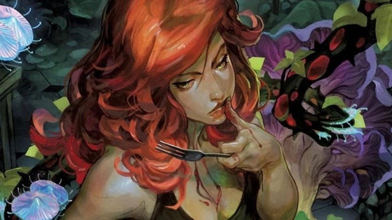 An illustration of Poison Ivy surrounded by plants and holding a fork in the cover of the comic book series Poison Ivy